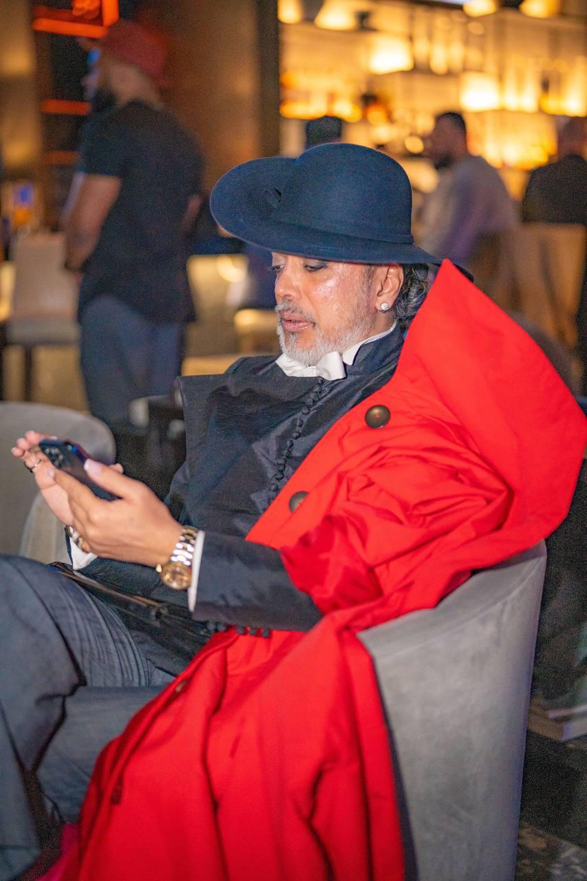 Evening event — red coat & hat