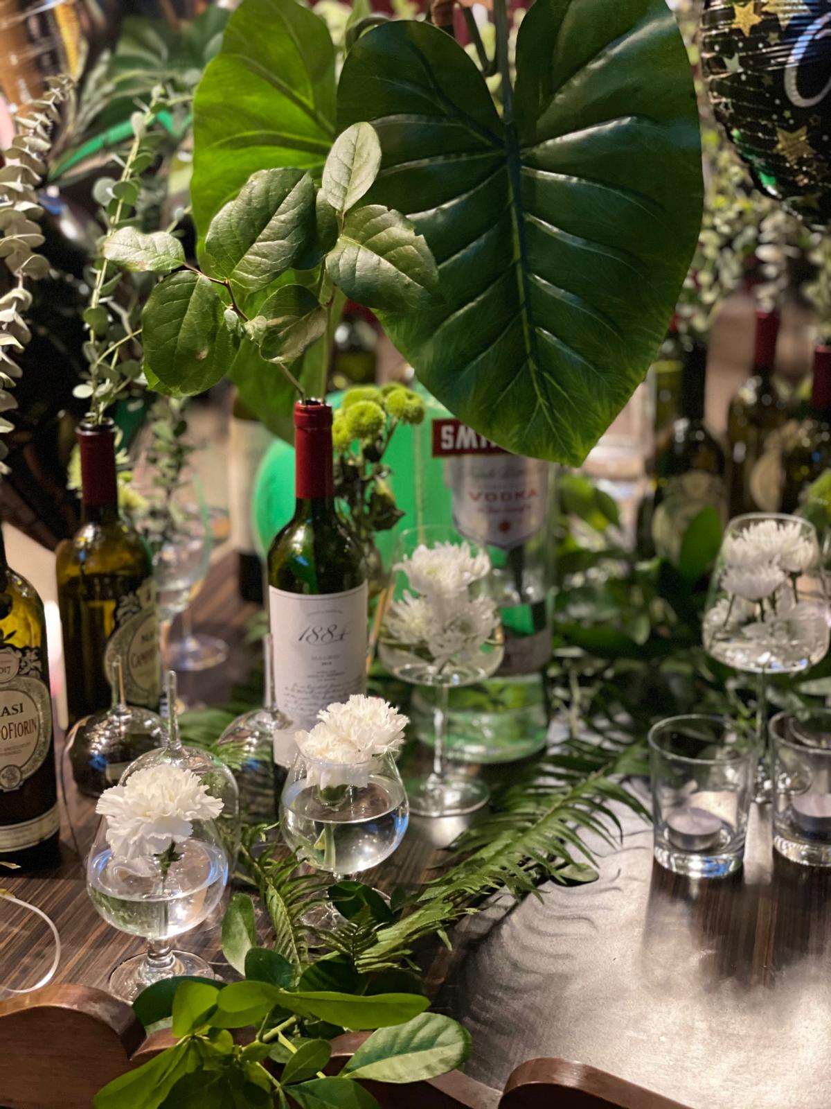 Event design — tropical greenery & wine
