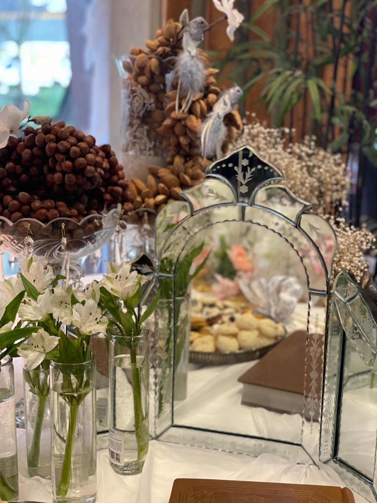 Sofreh detail — mirror, almonds & white alstroemeria