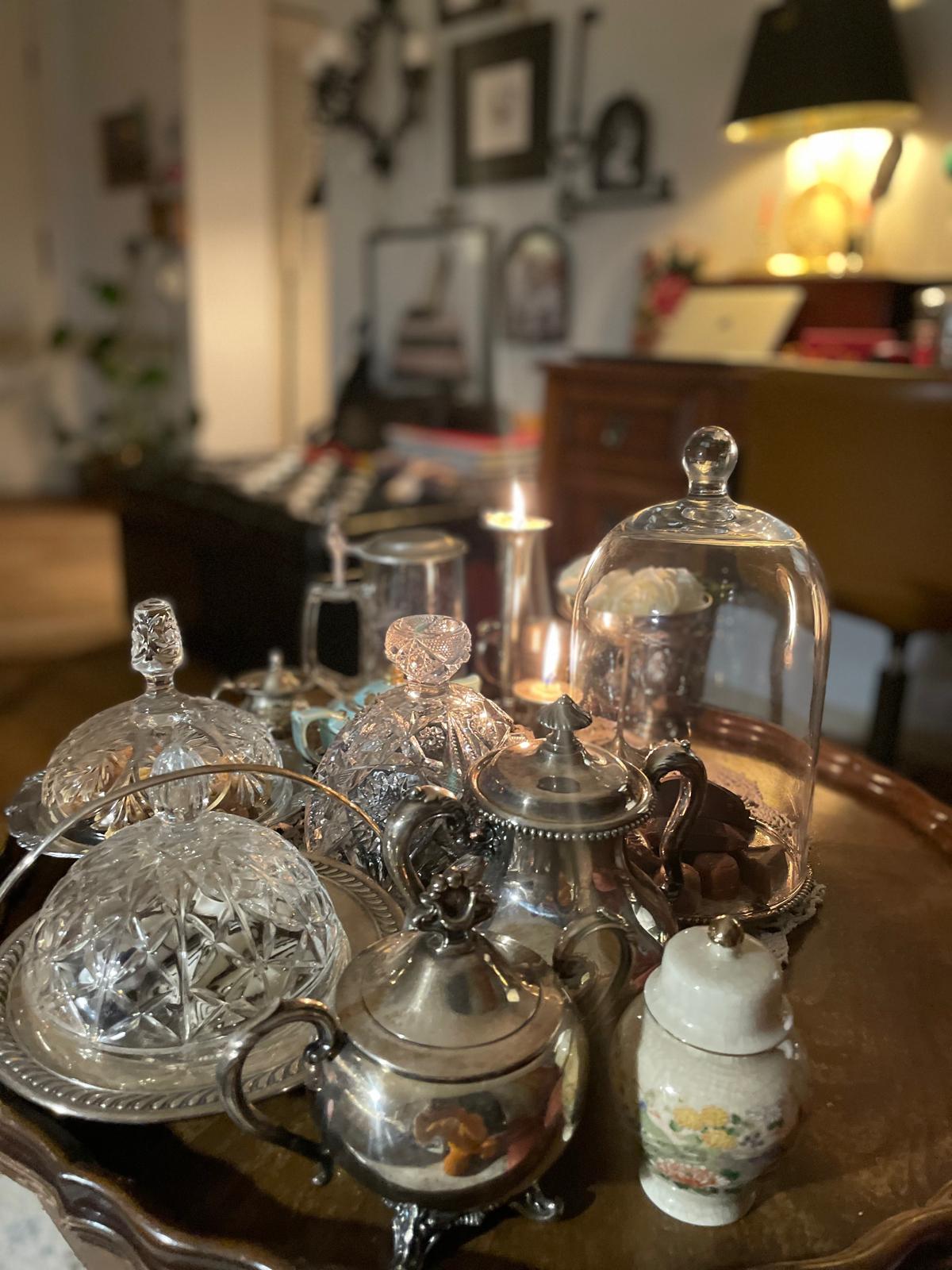 Interior vignette — silver, crystal & cloche
